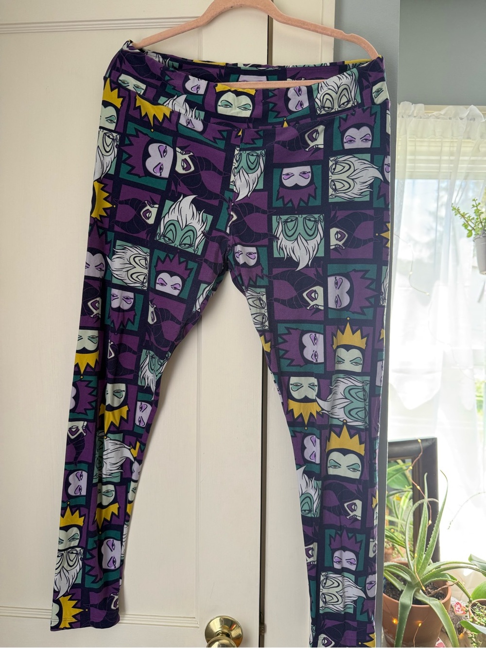 LuLaRoe Purple, Teal & Yellow Villain Print Leggings